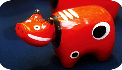 красная корова талисман